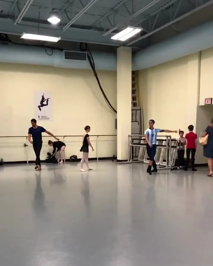 Lucas traveling across a ballet studio in a series of jumps