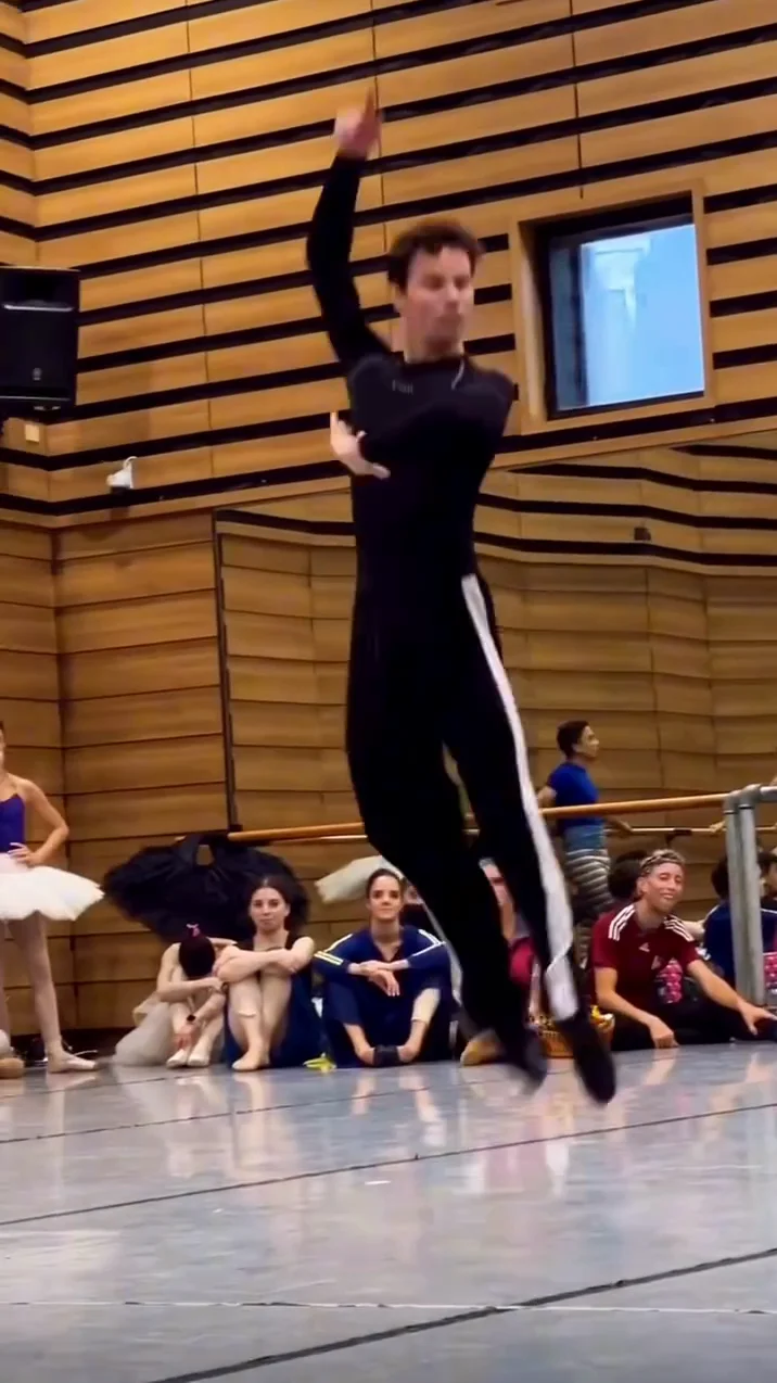 Ballet rehearsal with traveling steps, jumps, and turns
